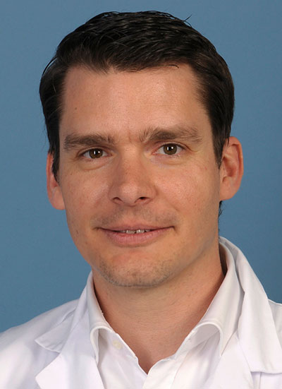 Portrait von PD Dr. med. univ. Dr. med. Dent. Philipp Metzler